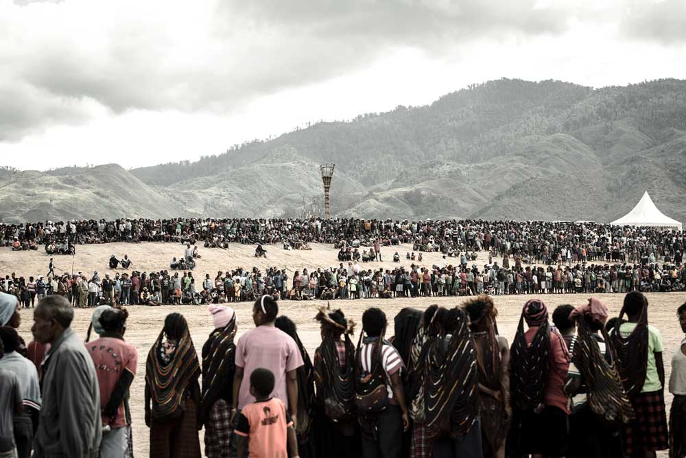 crowd of people standing in lines